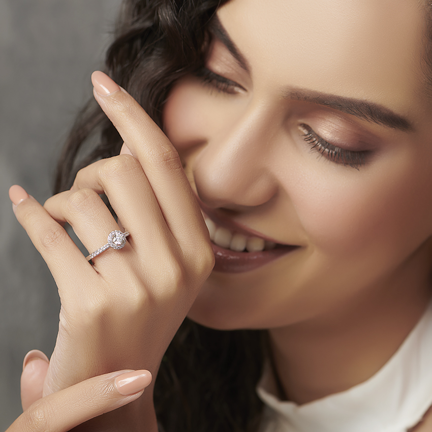 Round Halo Solitaire Ring